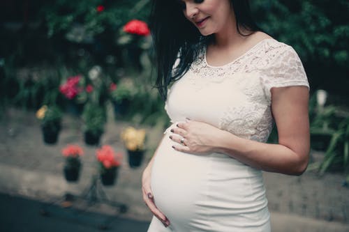 Why should you visit a qualified obstetrics specialist during your pregnancy?